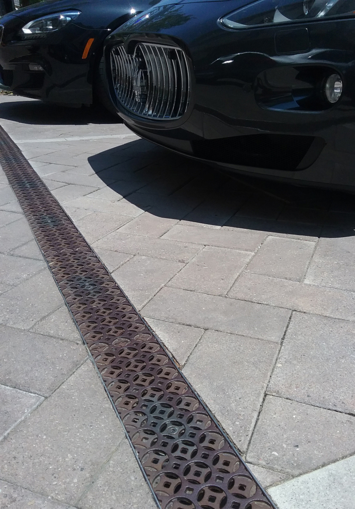 Cast iron trench drain grates in decorative Interlaken pattern