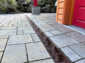 Decorative cast iron trench grates with Locust leaf pattern