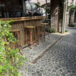 Cast iron trench drain grates in decorative Minnione pattern