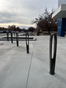 Decorative cast iron bollard with black powder coat finish in the "Needle" pattern from Iron Age Designs
