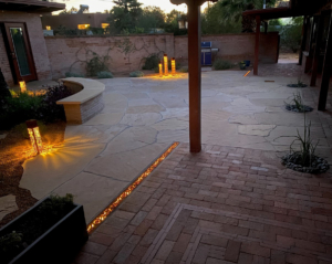 Decorative cast iron trench grate lit from below with LED lighting