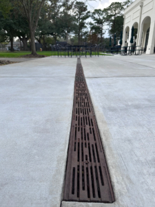 Decorative cast iron trench grate in Rain pattern