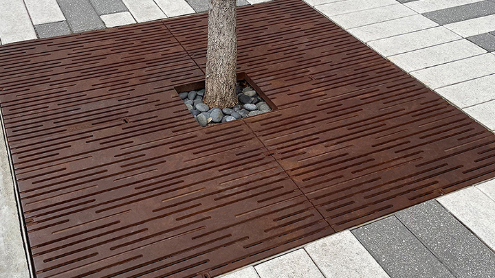 Decorative cast iron tree grate with Rain pattern
