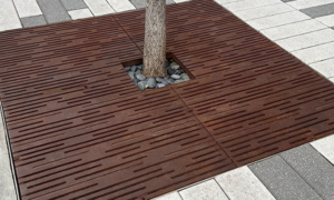 Decorative cast iron tree grate with Rain pattern