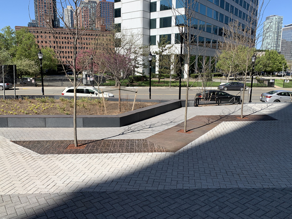 Decorative cast iron tree grate with Rain pattern