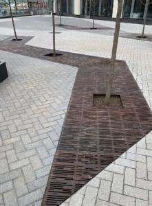 Decorative cast iron tree grate with Rain pattern