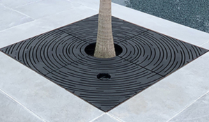 Decorative cast iron tree grate with concentric circular 'Spin' design