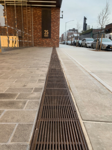 Que 12" x 24" heel proof trench grate