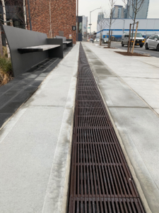 Que 12" x 24" heel proof trench grate