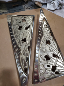 Cast bronze door pulls with butterfly wing design