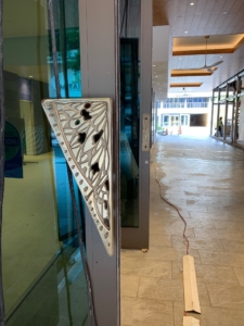 Cast bronze door pulls with butterfly wing design
