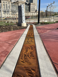 Cast iron trench grate with custom 'braid' pattern