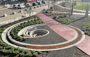 Cast iron radius trench grate with custom 'braid' pattern