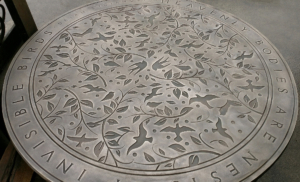 Cast bronze custom plaque with bird motif