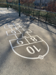 Laser cut stainless steel hopscotch embed in concrete