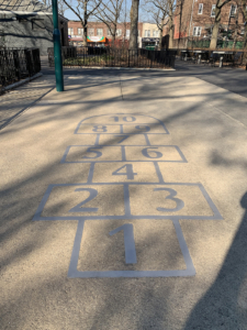 Laser cut stainless steel hopscotch embed in concrete