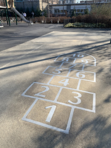 Laser cut stainless steel hopscotch embed in concrete