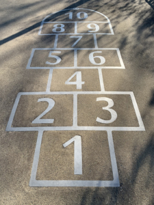 Laser cut stainless steel hopscotch embed in concrete