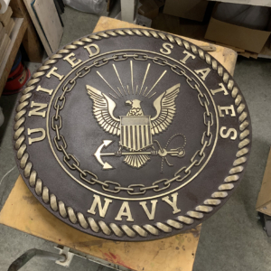 Cast Bronze plaque with "United States Navy" around border and insignia in the middle