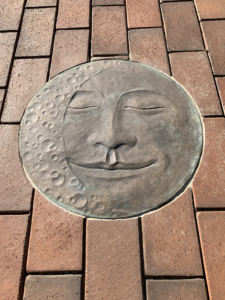 Cast bronze Moon Face embed plaque showing Waning Crescent moon face