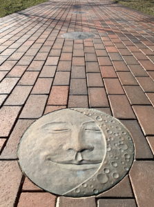 Cast bronze Moon Face embed plaque showing Waxing Crescent Moon face
