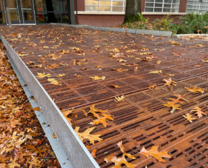 Pedestrian bridge constructed from Rain cast iron grate panels