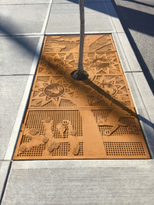 Custom cast iron tree grate designed for Spokane Arts