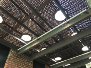 Pedestrian bridge made from decorative cast iron panels with light holes.