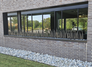 Laser cut steel grass panels