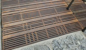 Cast iron drain grate with decorative Madras pattern