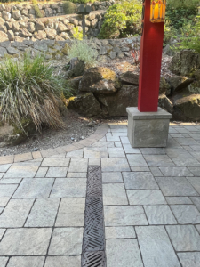 Decorative cast iron trench grates with southwest influenced Thunderbird pattern