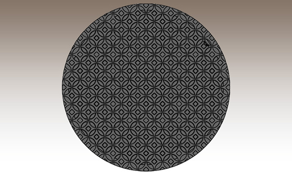 Decorative manhole cover in Interlaken pattern