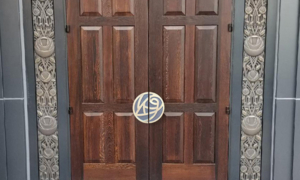 Entry Door with Cast Bronze Door Pulls in rose design