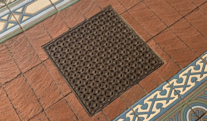 Cast iron grate in decorative Interlaken pattern by Iron Age Designs.