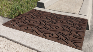 Cast iron grate in decorative Minnione pattern by Iron Age Designs.