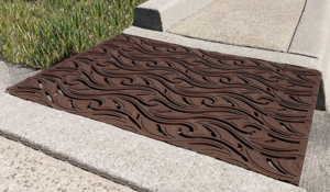 Cast iron grate in decorative Minnione pattern by Iron Age Designs.