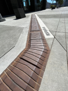 Decorative DWP / Wayfinding Tiles made from cast iron by Iron Age Designs