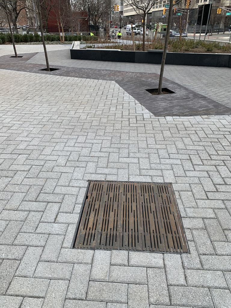 Cast iron grate in decorative Rain pattern by Iron Age Designs.