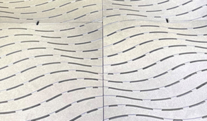 Cast aluminum grates in decorative Ripple pattern by Iron Age Designs.