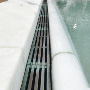 Photo Credit: Jon Lutton   Project: University of Virginia's Rotunda.Water garden design by Laurie Olin. Que 3" x 12", Cast Silicon Bronze   https://news.virginia.edu/content/thomas-jefferson-medalist-reimagines-rotunda-s-landscape