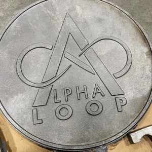 Cast Iron plaque with logo for Alpha Loop trail system in Alpharetta, GA