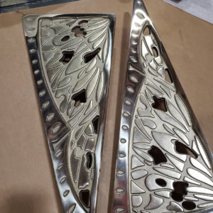 Cast bronze door pulls with butterfly wing design