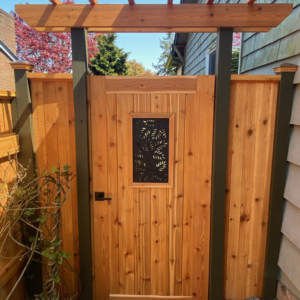 Cast iron grate with Locust pattern, inset into wooden gate