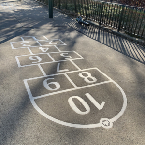 Laser cut stainless steel hopscotch embed in concrete