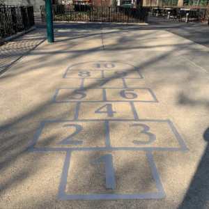 Laser cut stainless steel hopscotch embed in concrete