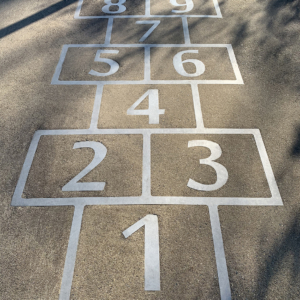 Laser cut stainless steel hopscotch embed in concrete