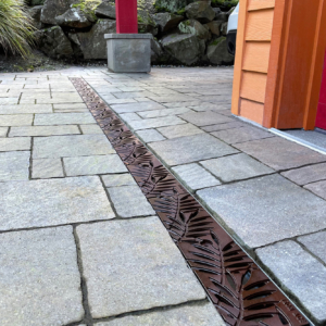Decorative cast iron trench grates with Locust leaf pattern