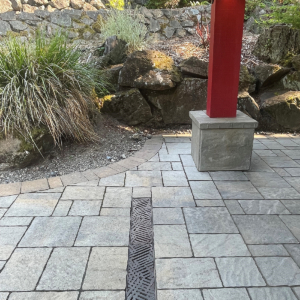 Decorative cast iron trench grates with southwest influenced Thunderbird pattern