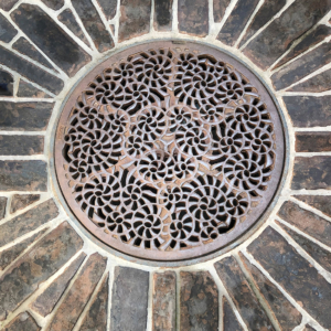 Decorative raw cast iron catch basin grate in Miso pattern