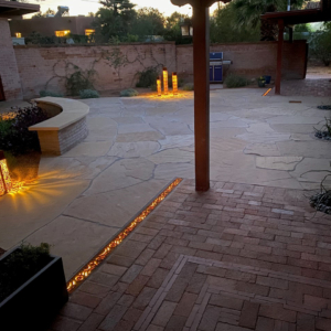 Decorative cast iron trench grate lit from below with LED lighting